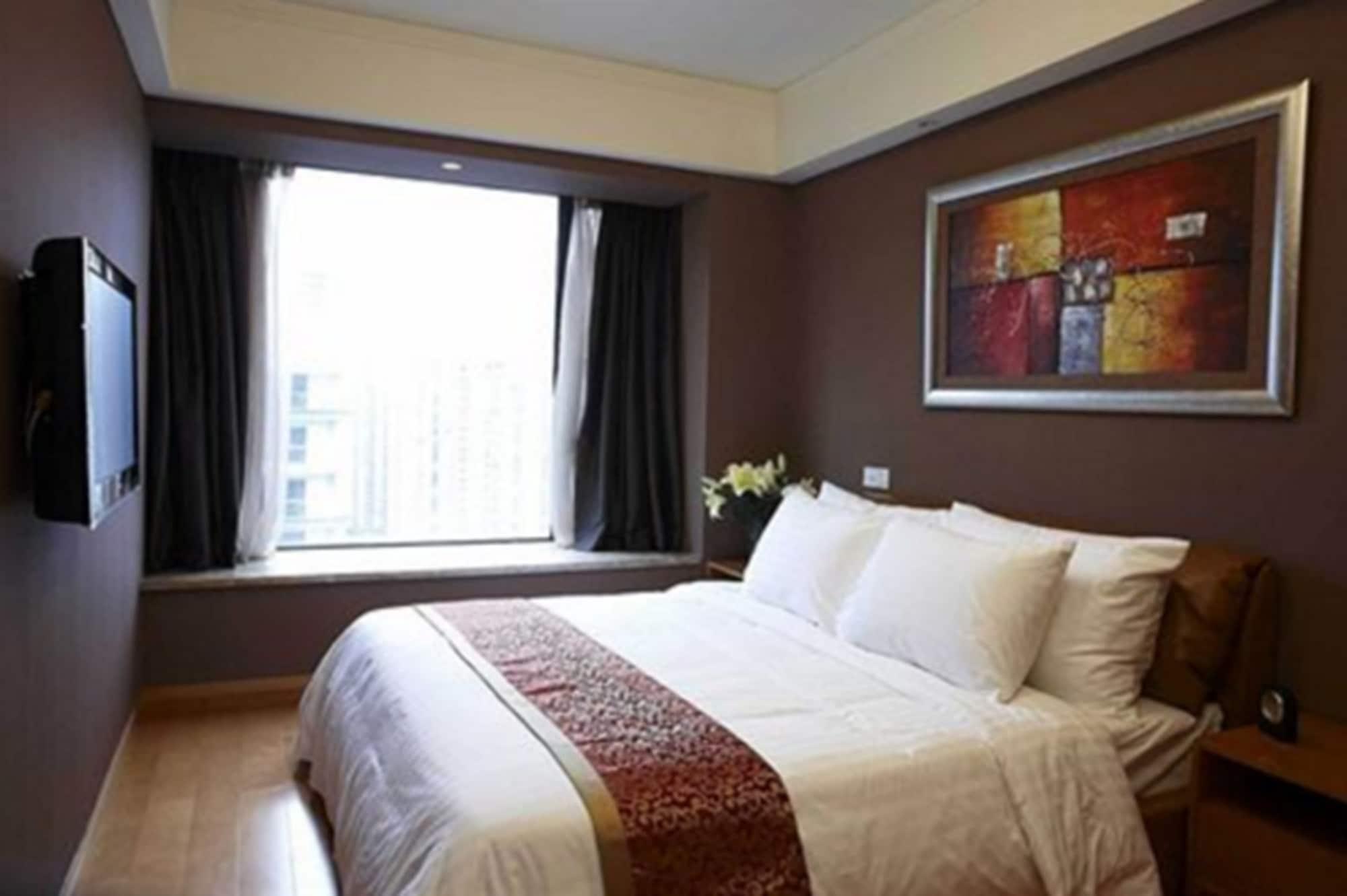 Dan Executive Hotel Apartment Zhujiang New Town Гуанчжоу Екстер'єр фото